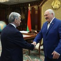 Belarus frees 52 prisoners, including veteran dissident, journalists