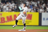 Yankees rally past White Sox 3-2, clinch playoff berth and close within 1 game of Toronto in AL East