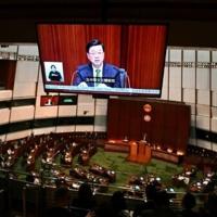 Hong Kong leader unveils plan to boost growth with border mega