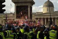 London protest organized by far-right activist exceeds 100,000 as clashes break out