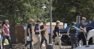 Authorities say student who had been radicalized fired revolver at Colorado school, wounding 2