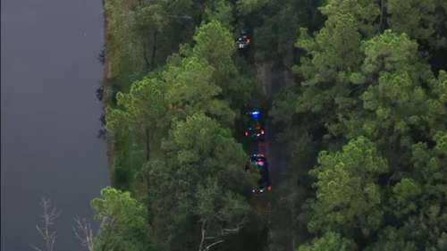 Heavy law enforcement presence near pond in Liberty County; Life Flight responding, SkyEye video shows
