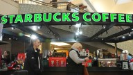 Starbucks to close stores, lay off 900 workers as part of turnaround plan