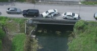 Driver pulled from water after truck plunges into canal near Miami