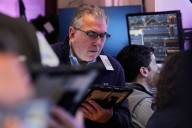 Wall Street ticks toward more records as inflation slows and Oracle soars