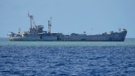 Philippine forces deliver supplies and personnel to disputed South China Sea shoal despite tensions