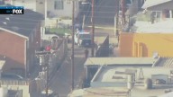 Standoff between possible murder suspect, LAPD
