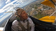 96-year-old veteran flies again in historic biplane