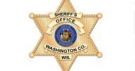 Woman dead, man injured in semi versus passenger vehicle crash in Washington County
