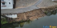 Lake of the Ozarks shoreline wall collapses, leaving parked cars right near the edge