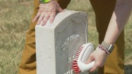 Grave cleanup at Jefferson Barracks Cemetery