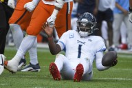 Denver's defense swarms top overall draft pick as Titans' Cam Ward loses NFL debut