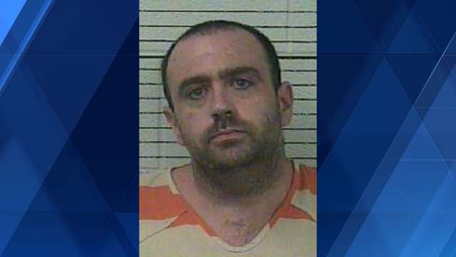 Kentucky man arrested after corpse of Colorado man, two animals found inside home