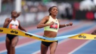 Injured Olympic 200m champion Thomas out of World Championships
