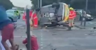 Moment police car is flipped over in horror crash on East Lancs Road