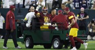 Commanders defensive end Deatrich Wise Jr. carted off the field with right leg injury vs. Packers