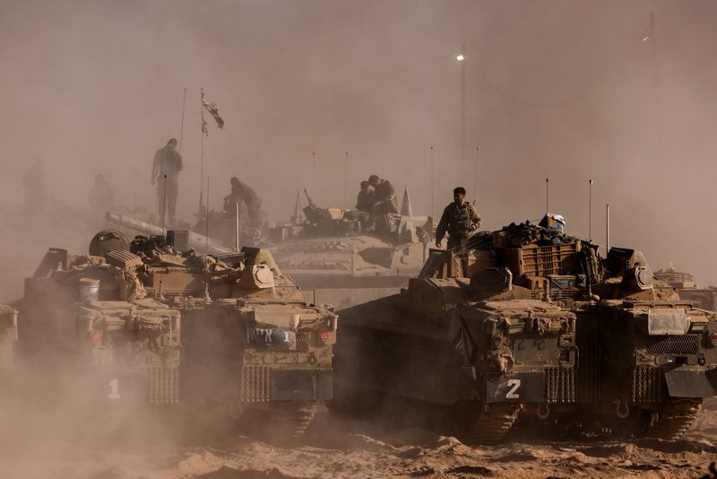 Thousands of Israeli reservists report for duty as military chief clashes with ministers