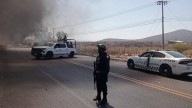 Encuentran cuerpo descuartizado junto a cartulina, en Michoacán