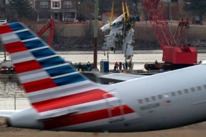 Family of 1 of the 67 Washington plane crash victims sues the FAA, Army and American Airlines