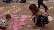 Protesters chalk Orlando City Hall sidewalks in fight for queer visibility