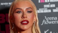 Christina Aguilera recreates 'Dirrrty' look from 2002 in skintight leather bodysuit and chaps