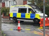 Driver killed as car collides with building in early morning smash