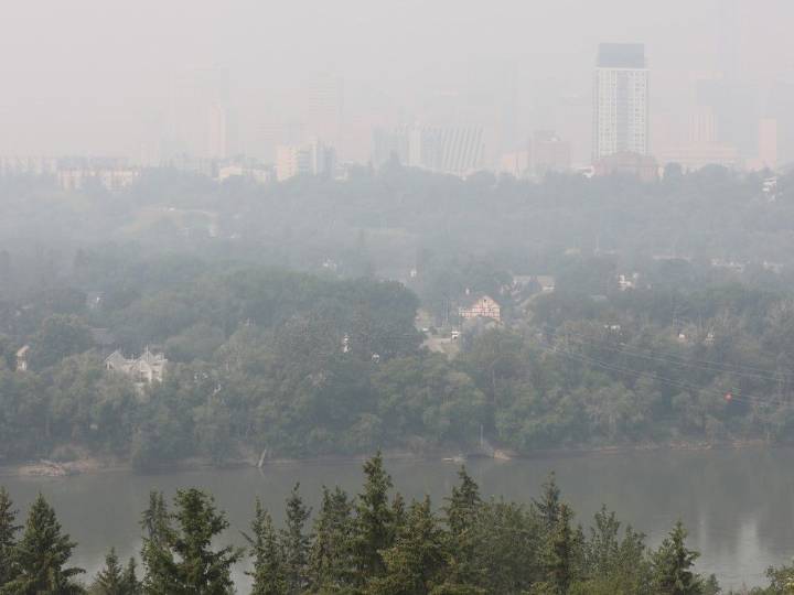 Smoke from swirling wildfires envelopes Edmonton area, triggers alerts