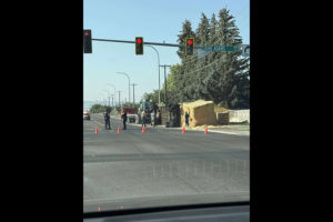 Semi-truck carrying haystacks overturns on Hitt Road in Idaho Falls