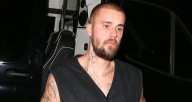 Justin Bieber Shows Off Tattooed Arms as He Steps Out for Evening Church Service 
