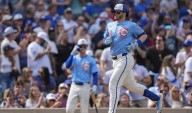 Happ homers, Cubs push past Rays 6