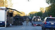 Drone video shows aftermath of fire and shooting at Michigan church