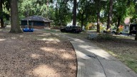 Officer puts suspect in neck hold in Portland park after struggle for gun