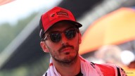 Bagnaia smashes lap record to storm to pole at Japanese MotoGP