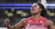 Rogers wins gold, sets Canadian record in hammer throw at world championships
