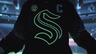 Kraken unveils new all-black third jersey that glows in the dark