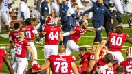 How many wins does Indiana football have over top