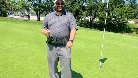 Massillon resident wins new car after sinking his first hole