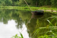 Man Dies After Falling into Pond While Boating with 6