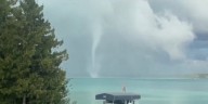 Tornadic waterspout caught on camera on Torch Lake