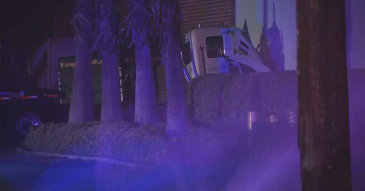 Person dead in Carson after semi-truck slams into side of building