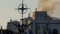 Ukraine government building damaged in Kyiv in the largest Russian attack since the war began
