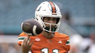 No. 5 Miami takes on No. 18 USF in matchup of quarterbacks on hot streaks