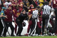 Washington Commanders coach bloodied after collision with quarterback