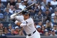 Trea Turner wins NL batting title with record-low .304 average, and Aaron Judge leads majors at .331