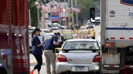 ICE officer fatally shoots suspect after being dragged by car near Chicago, officials say