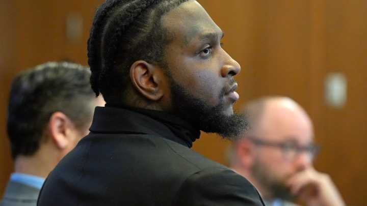 Did Akron man properly invoke right not to testify in murder trial?