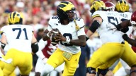 Bryce Underwood argues with teammate on sideline during Michigan vs Oklahoma