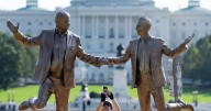 Statue of Trump, Epstein holding hands briefly appears in Washington, D.C.