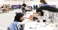 Building a robot at the Kids Robotics Workshop at New Haven Jr./Sr. High School