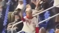 Shocking gesture from 'Phillies Karen' caught on camera after she confronted dad over home run ball
